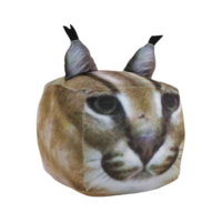 A cube-shaped plush with triangular ears and a caracal cat's face textured on it